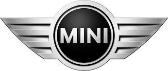 Logo of MINI car brand featuring a black circular emblem with wings extending outward.